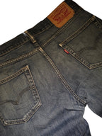 R3VIVED vintage Levi's 511 custom bootcut jeans in blue denim with back pockets and leather brand patch