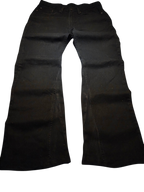 R3VIVED custom black Levi's 514 bootcut jeans with flared leg opening on a dark grey surface