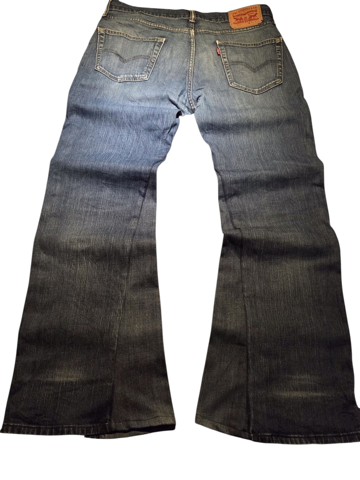 R3VIVED vintage Levis 511 custom blue denim bootcut jeans with back pockets and leather brand patch