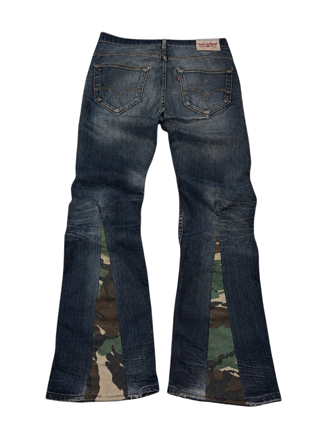 R3VIVED custom Levi bootcut jeans in blue denim featuring unique camo pattern flare inserts at the leg hems