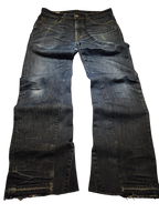 R3VIVED custom Levi's 511 bootcut jeans in dark blue denim with a frayed hem and subtle whiskering detail.