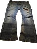 R3VIVED custom blue denim bootcut jeans with leather patch distressing and flared leg opening